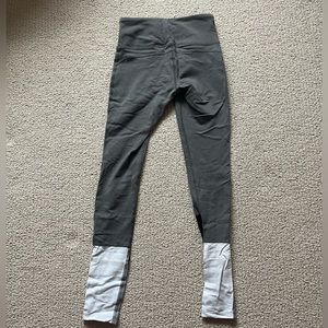 Splits59 Grey Leggings with white color patching on bottoms and black mesh